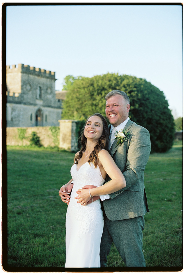 Couple outside Ivy lodge on film 