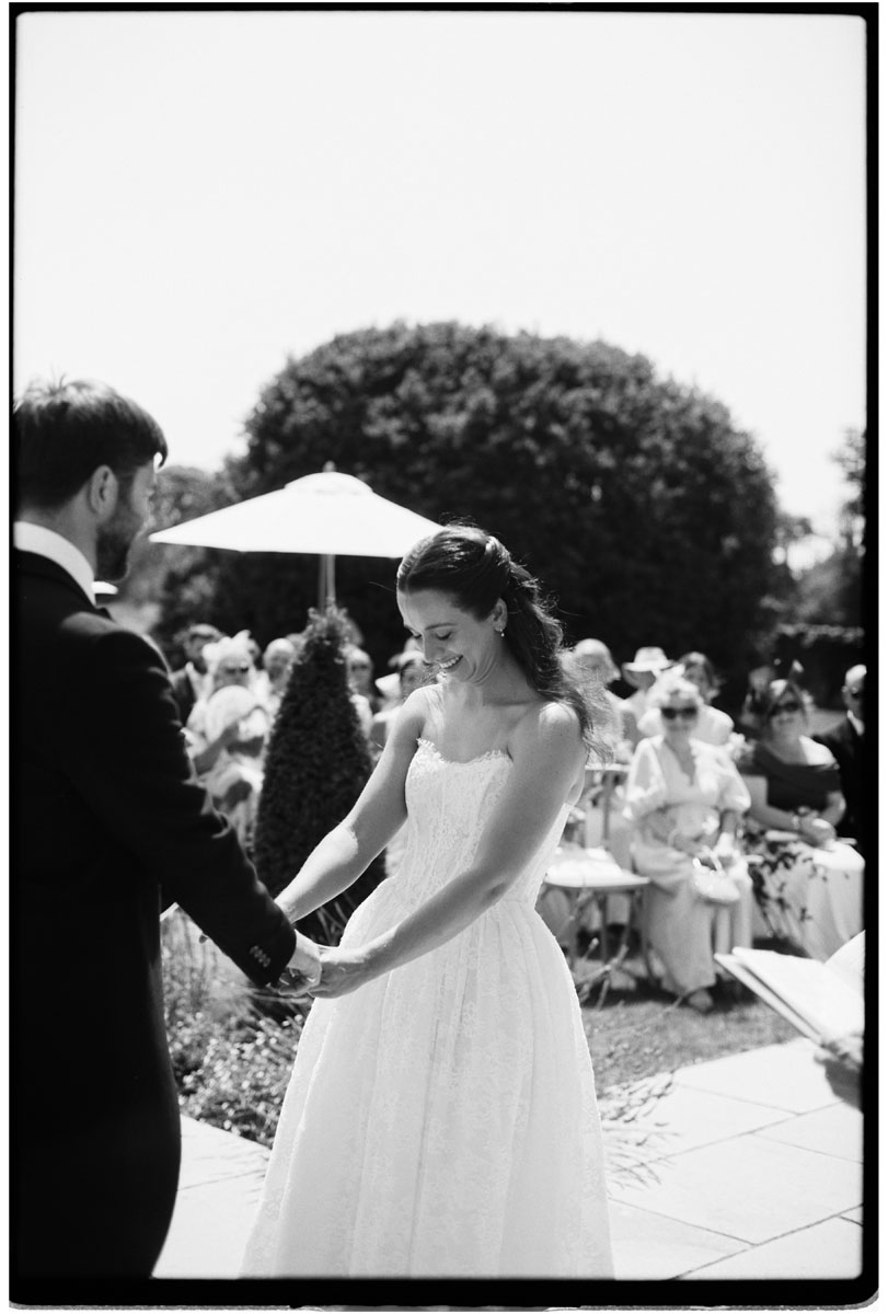 Emotional wedding ceremony moment photographed on analogue film