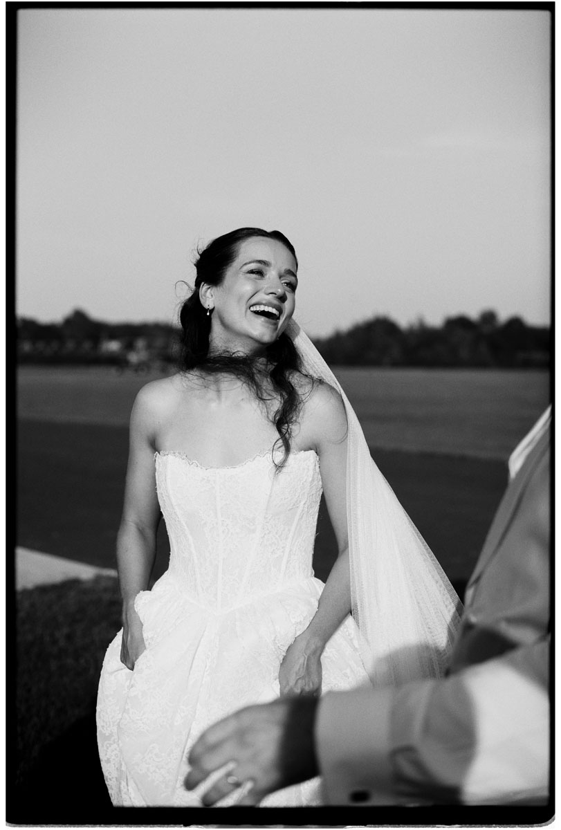 Relaxed wedding portraits on film at a Cotswolds country house wedding in black and white 