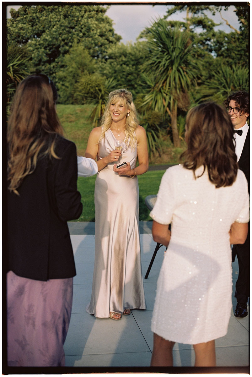 Documentary-style film wedding photography during a Cotswolds reception