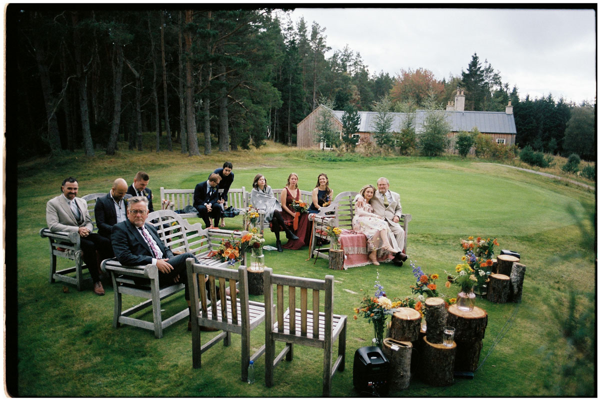 Outdoor wedding ceremony photographed on film at a Cotswolds wedding venue