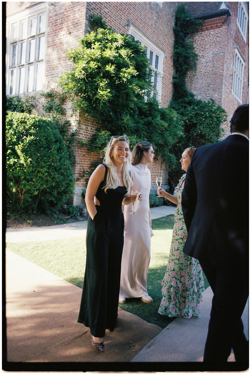 Documentary-style film wedding photography during a Cotswolds reception