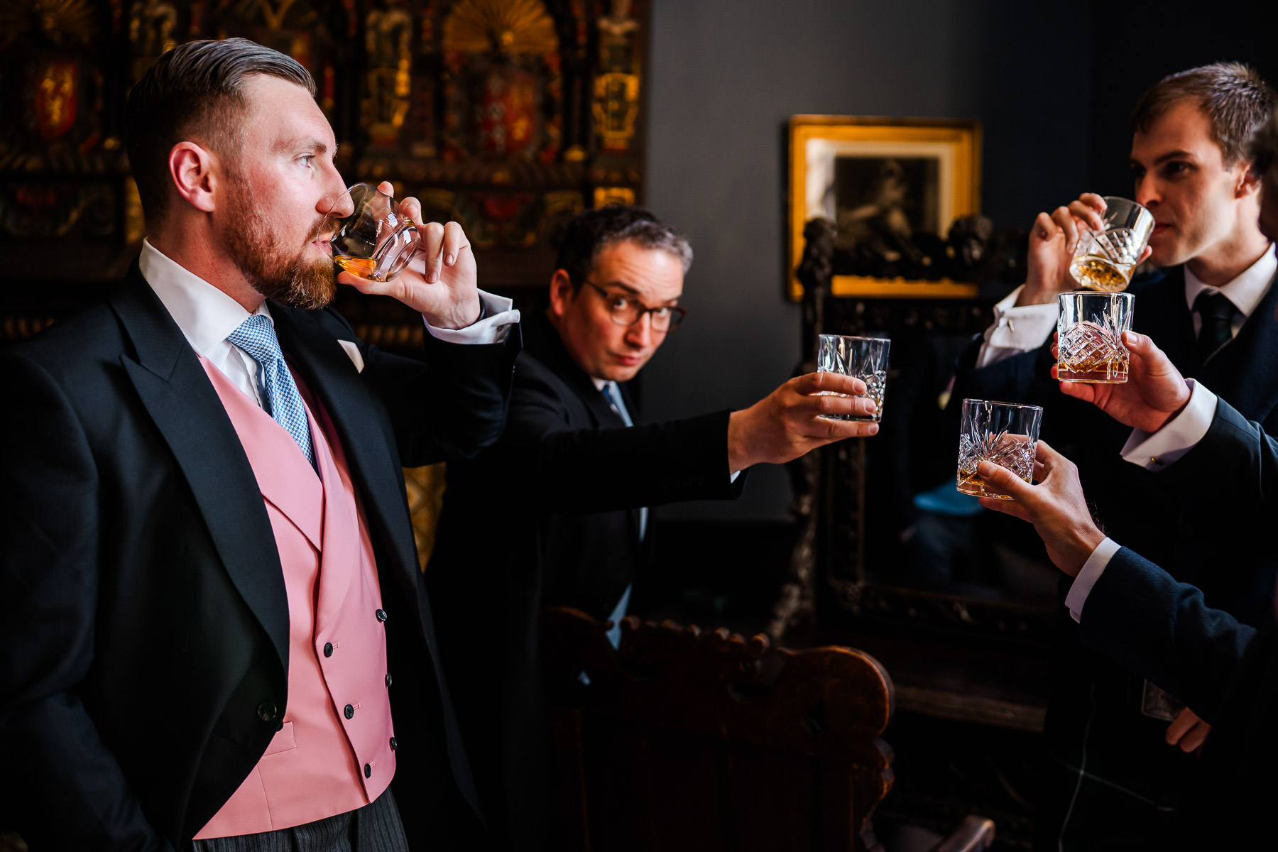 Groomsmen having a whiskey at Elmore Court  