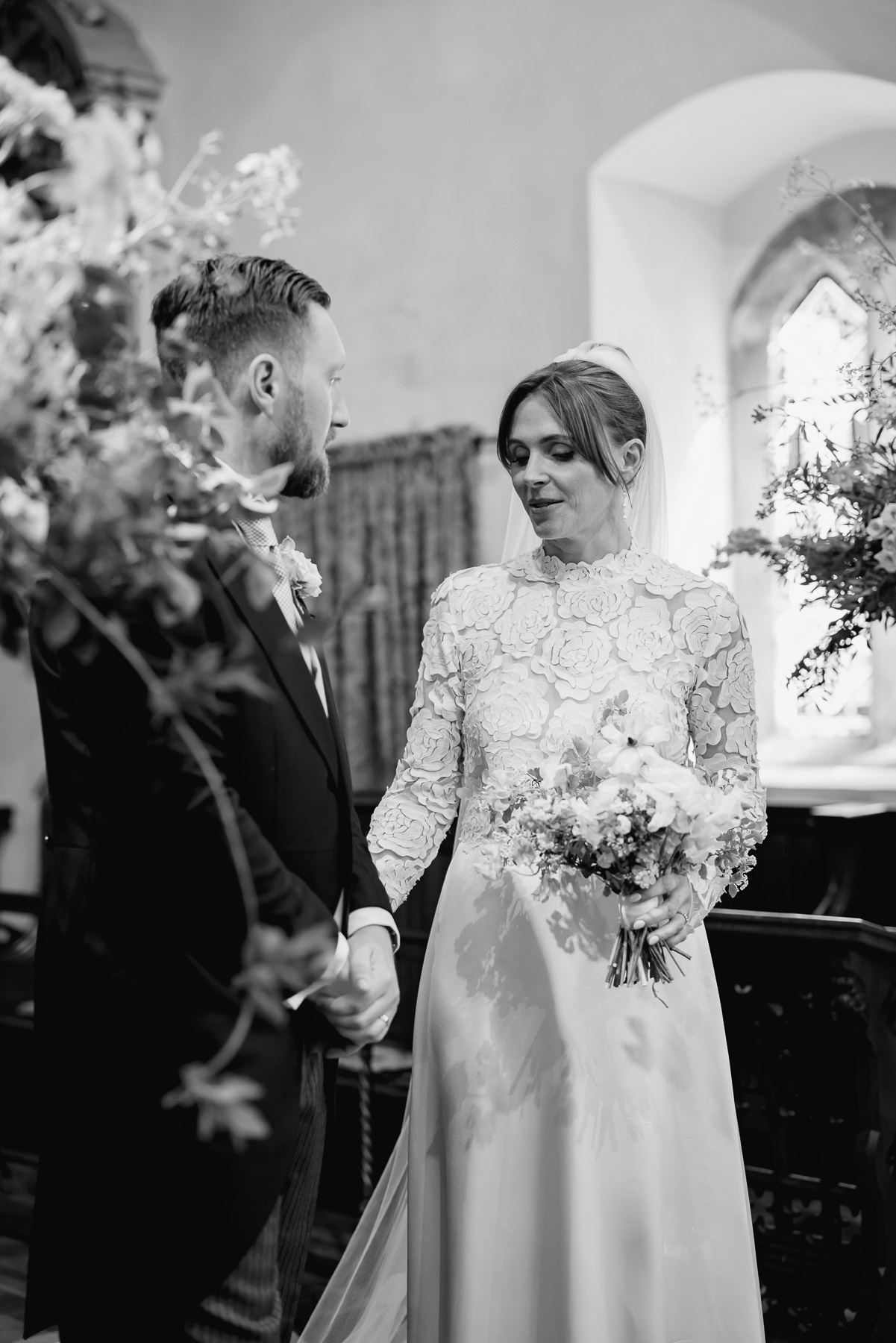 a moment at the alter at Elmore Church. Allie looks at her feet  