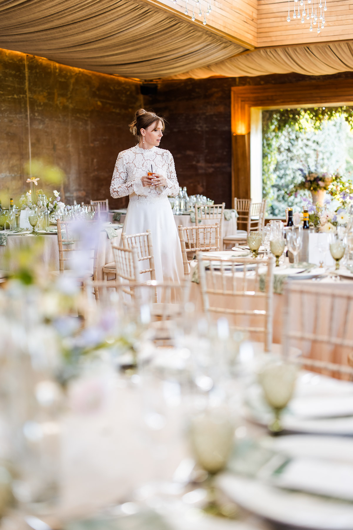 Allie looking at her beautiful wedding breakfast at Elmore 