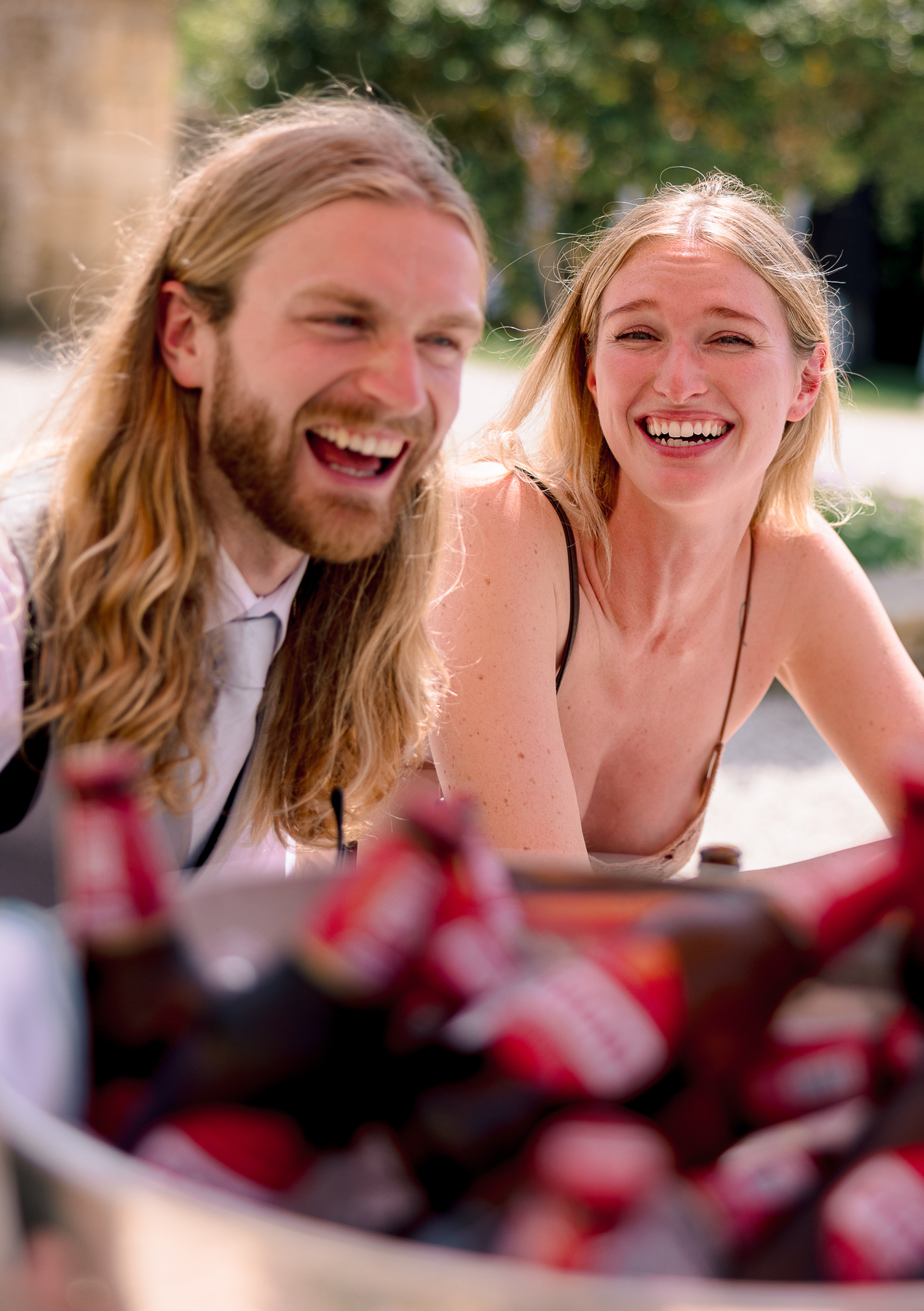 Couple laughing at the drinks reception  
