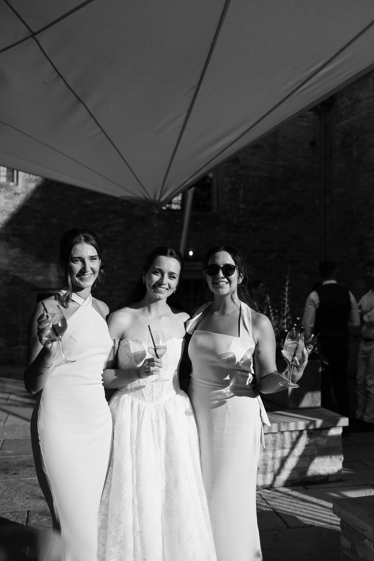 Girls standing in the sun 