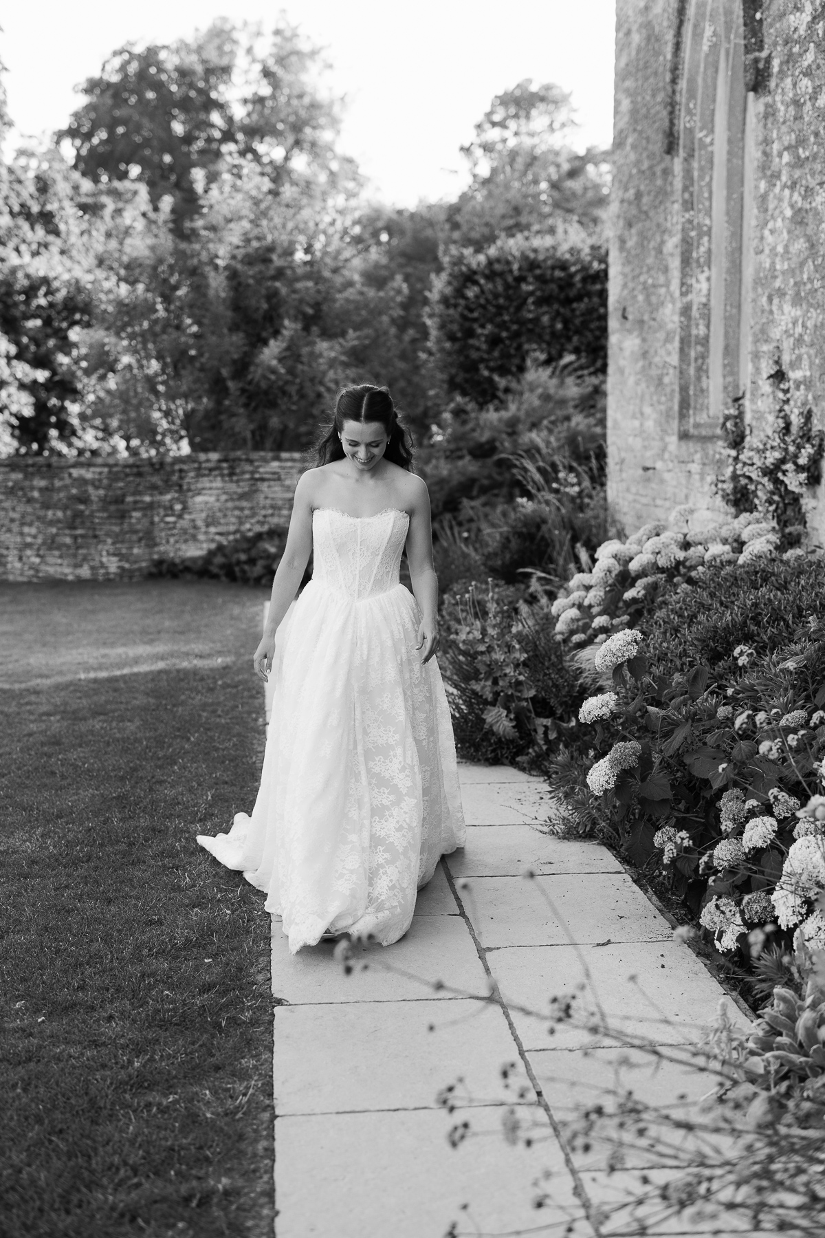 Bride on her own outside Ivy Lodge 