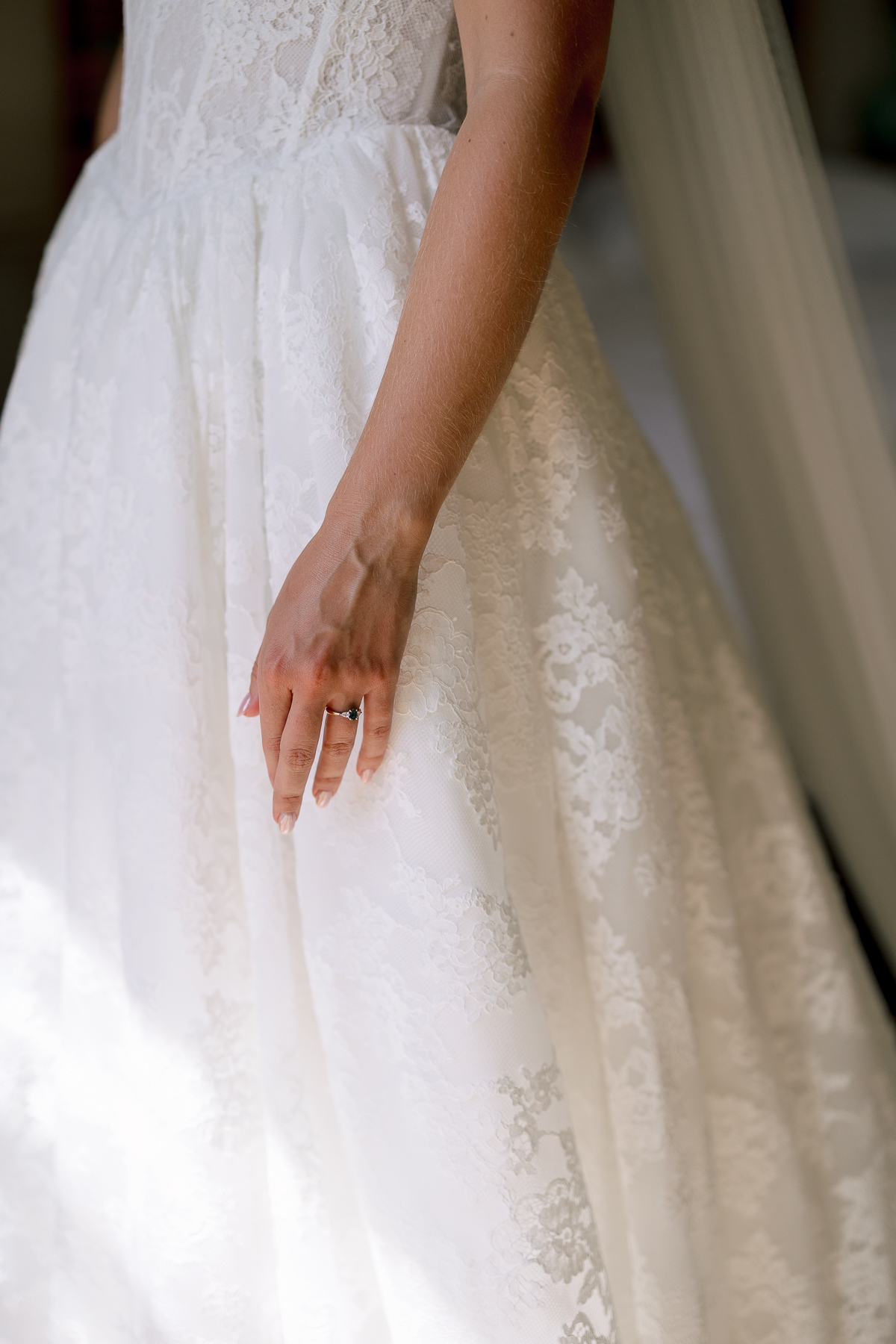 Brides hand with engagement ring