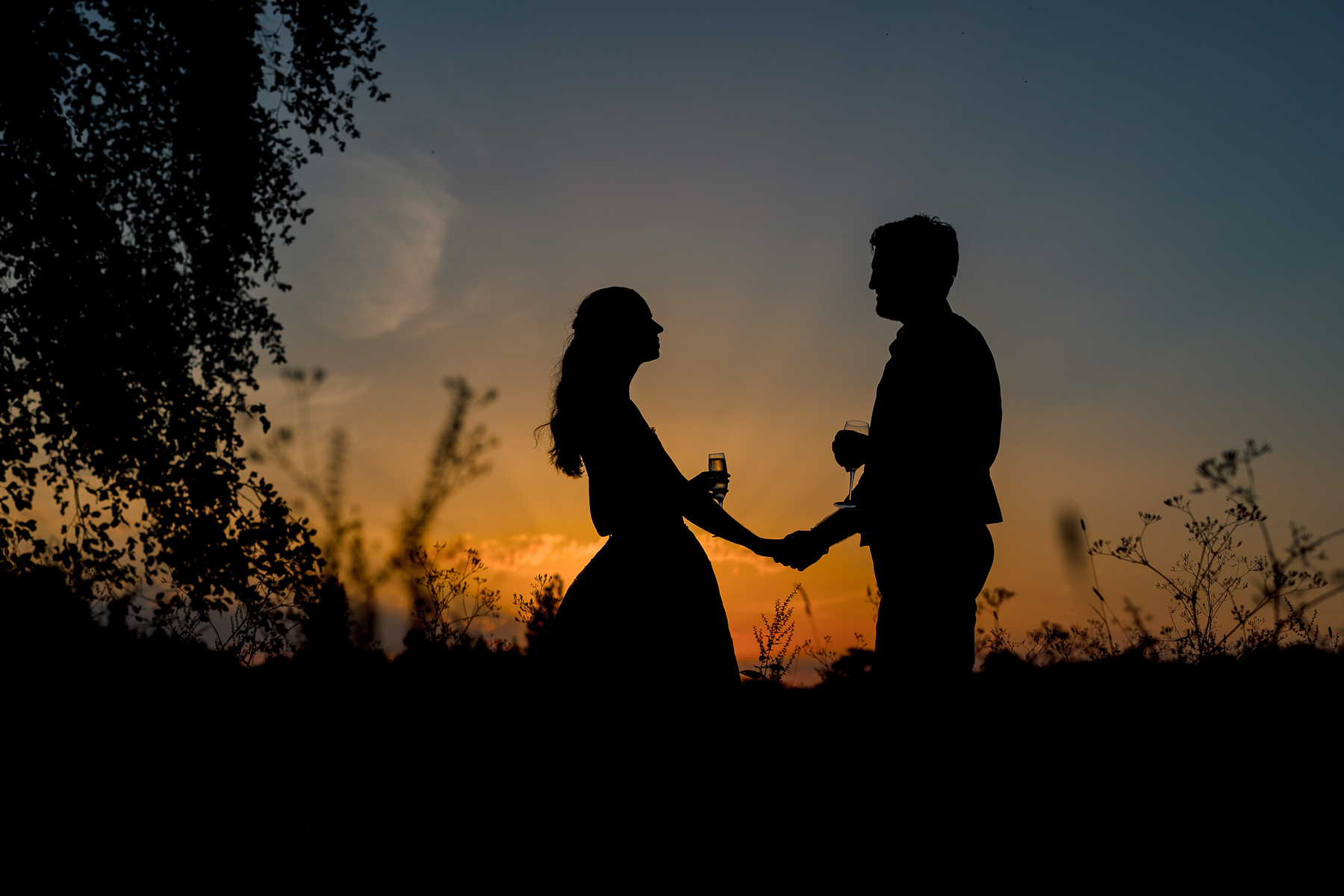 silhouette of the couple at sunset 