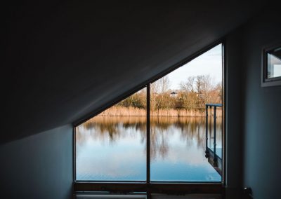 Window onto a Cotswold lake