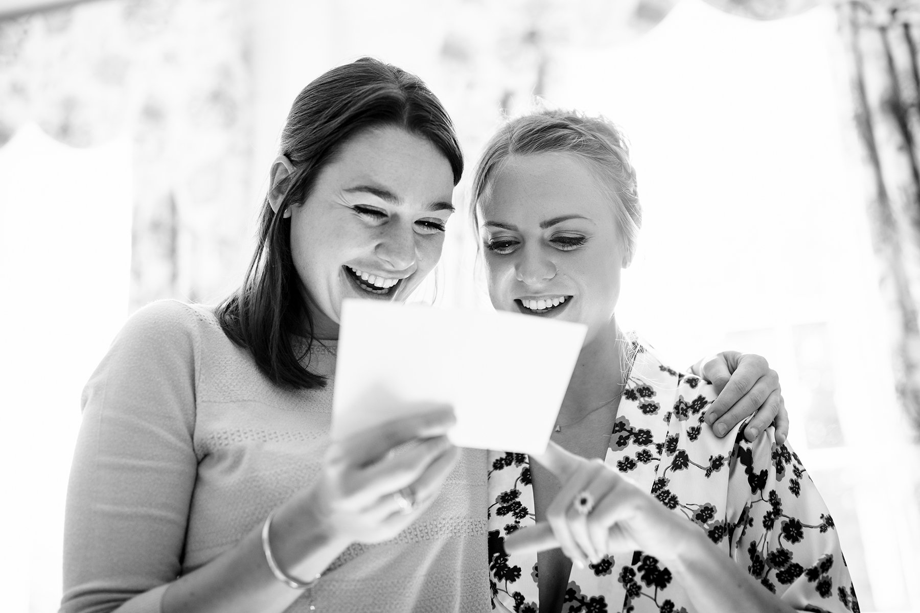 Bride at elmore reading a card
