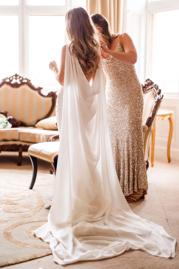 Couples up on the shoulders of their friends on the dancefloor