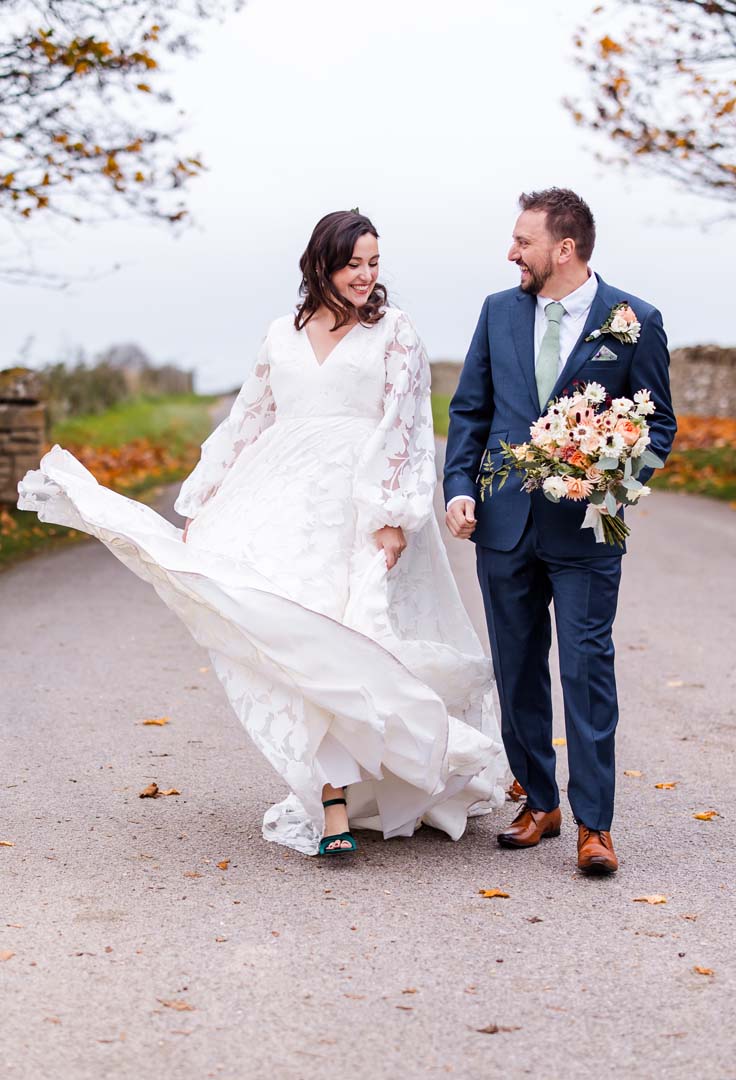 Guest at stone barn laughing 