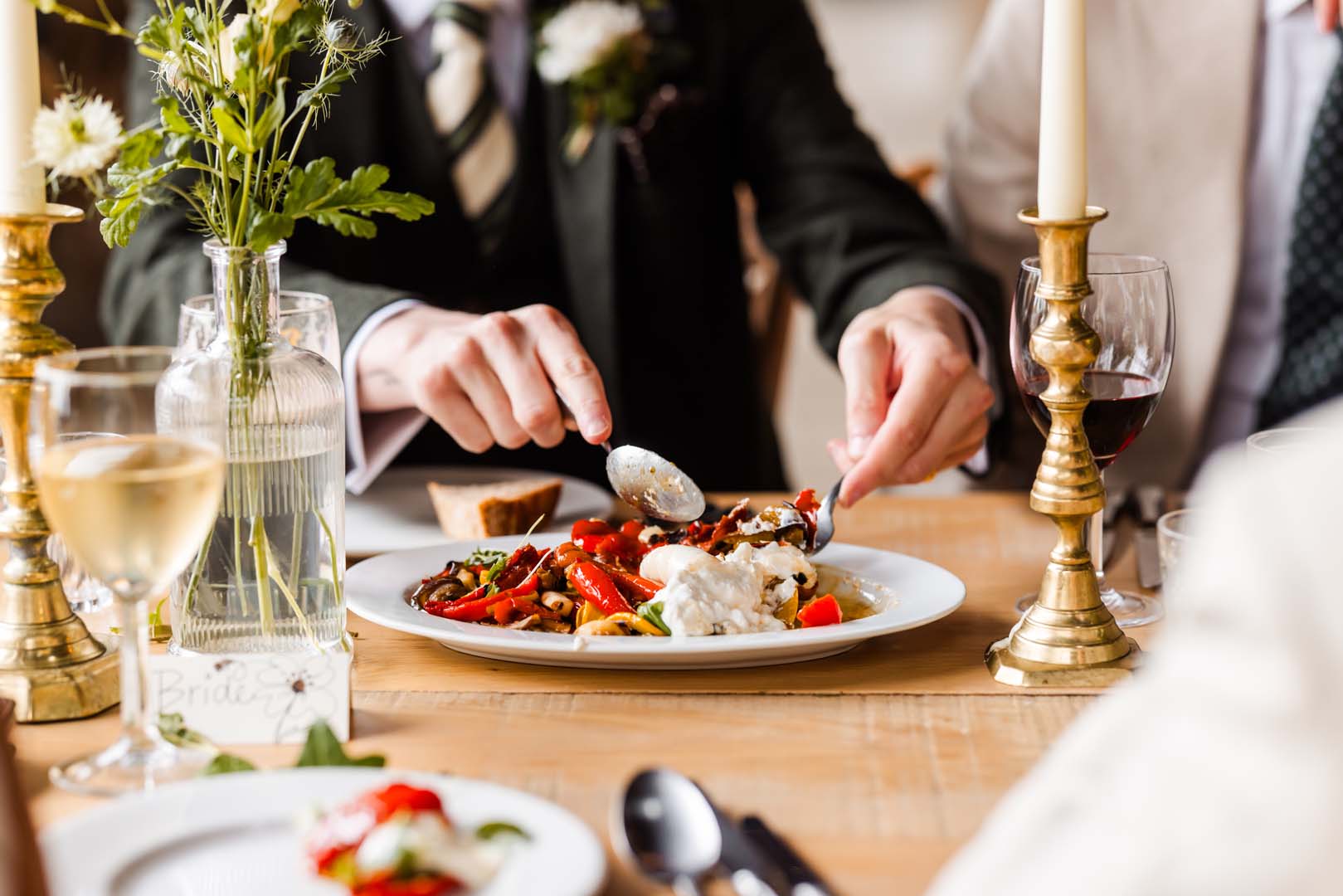 Couples up on the shoulders of their friends on the dancefloor