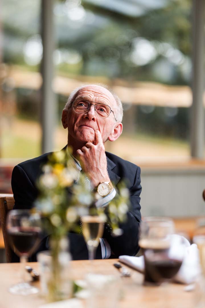 Couples up on the shoulders of their friends on the dancefloor