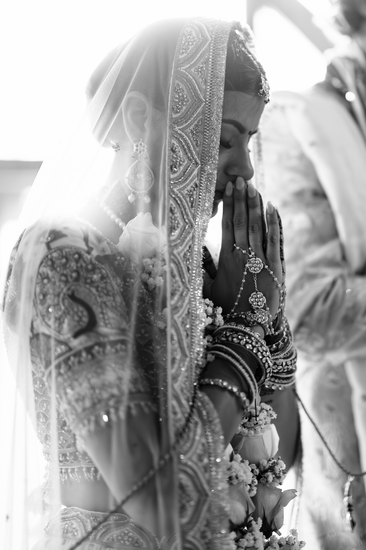 Bride paying at stone barn 