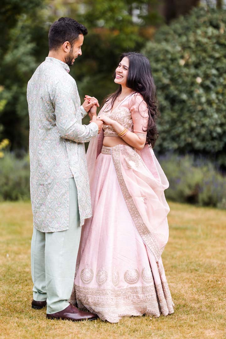 Couples up on the shoulders of their friends on the dancefloor