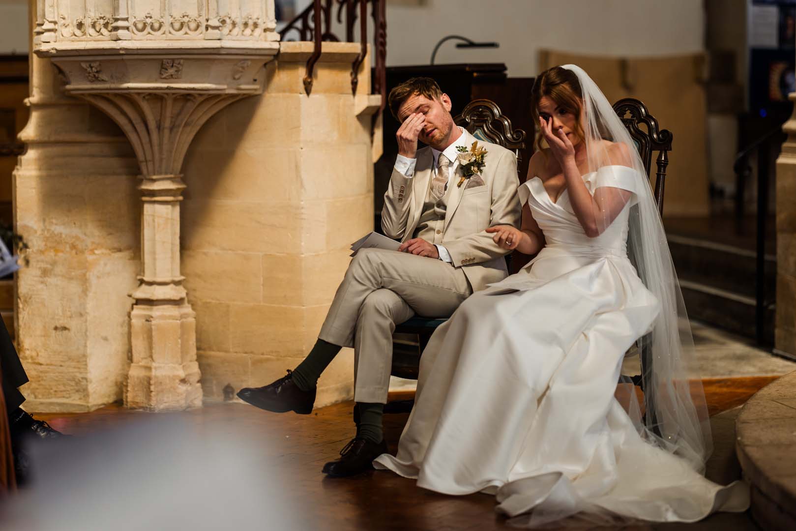 Couples up on the shoulders of their friends on the dancefloor